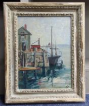 An oil on board depicting a moored fishing boat, initialled to the corner and label verso, inscribed