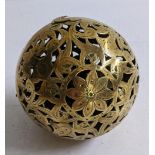 A 19th century spherical brass hand warmer Location: