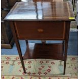 An Edwardian mahogany and boxwood inlaid sewing table having a hinged top with shelf below, 78.5cm h