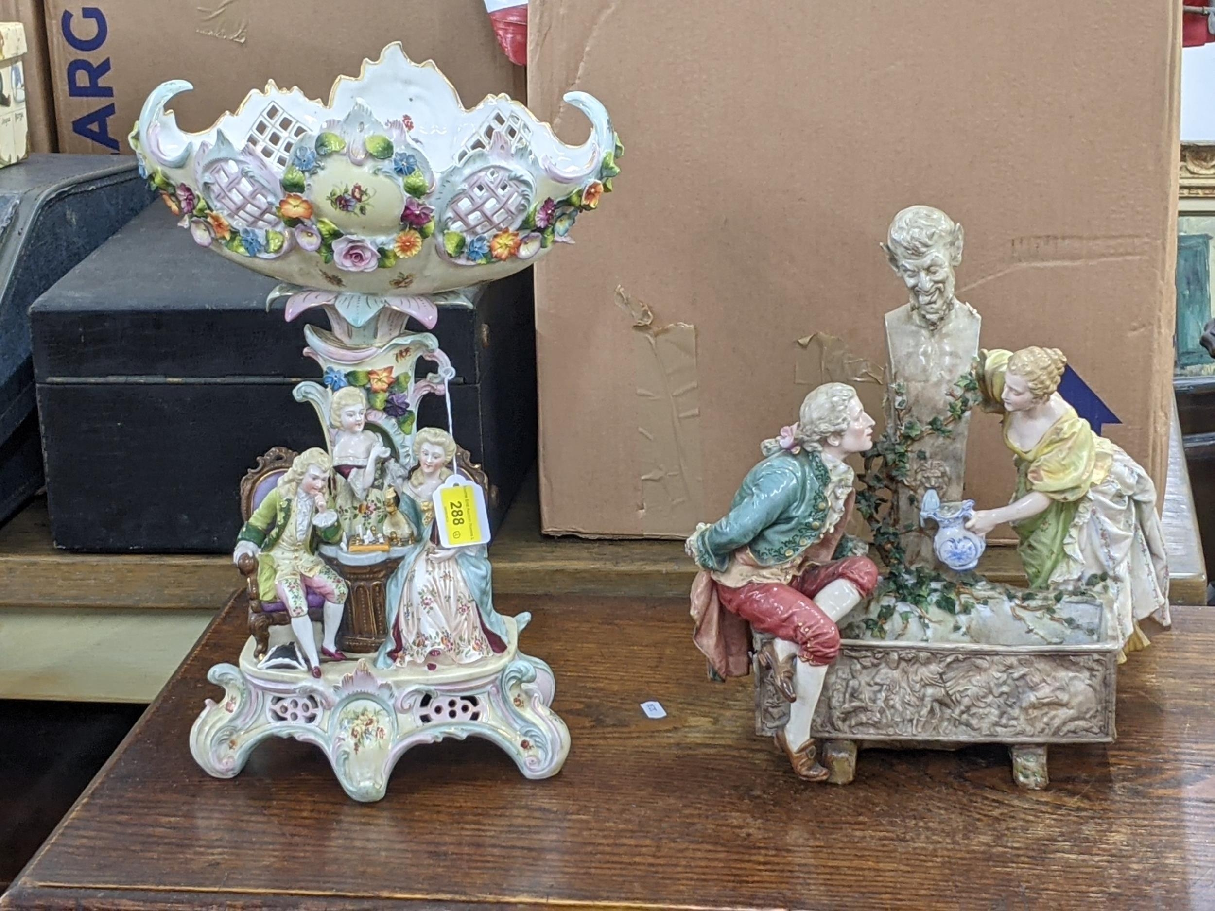 A (possibly German) elaborately decorated table centrepiece with a pierced basket on top decorated