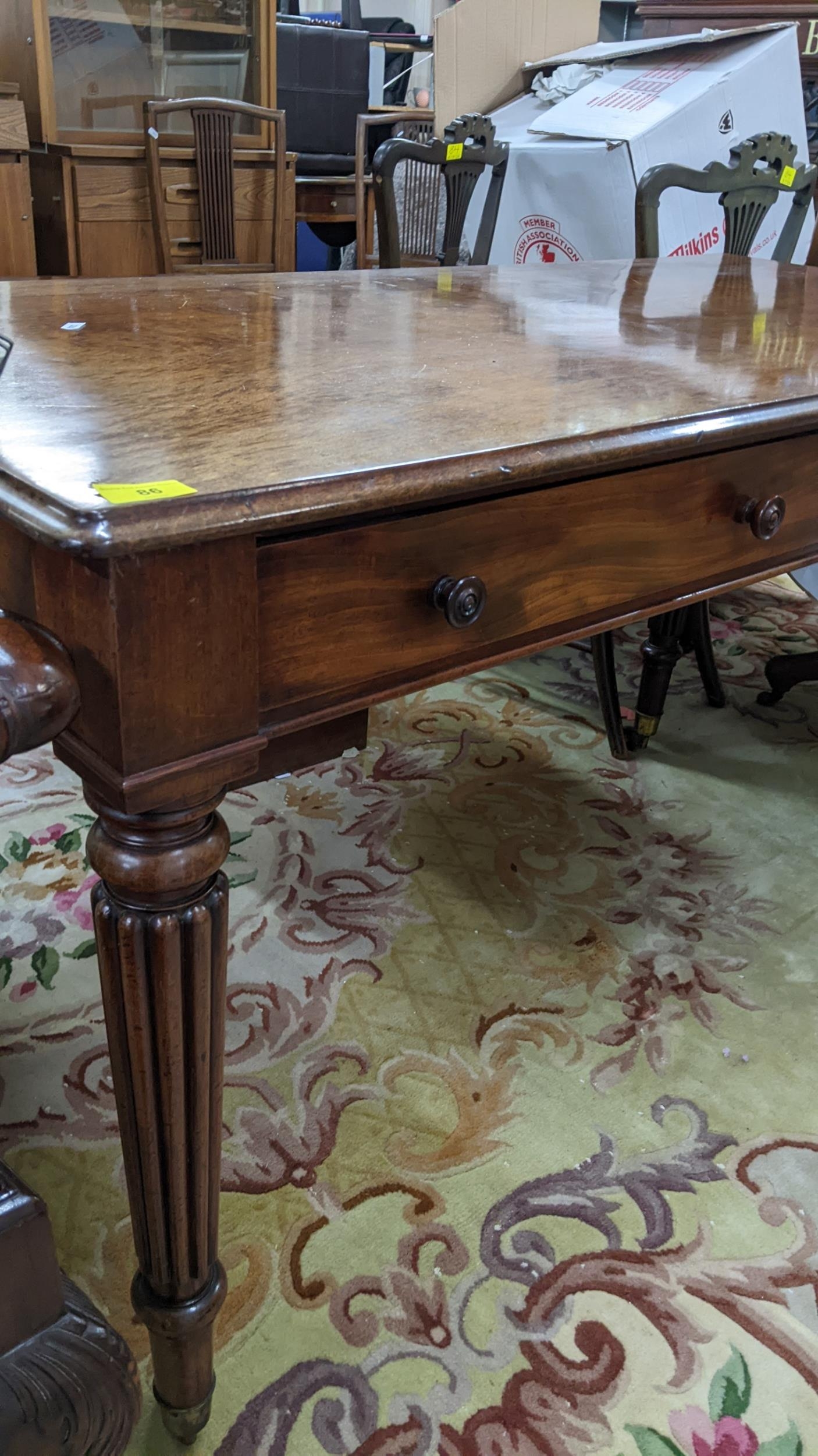 A late Victorian Warring & Gillows style side table having two short drawers and reeded tapering - Image 3 of 5