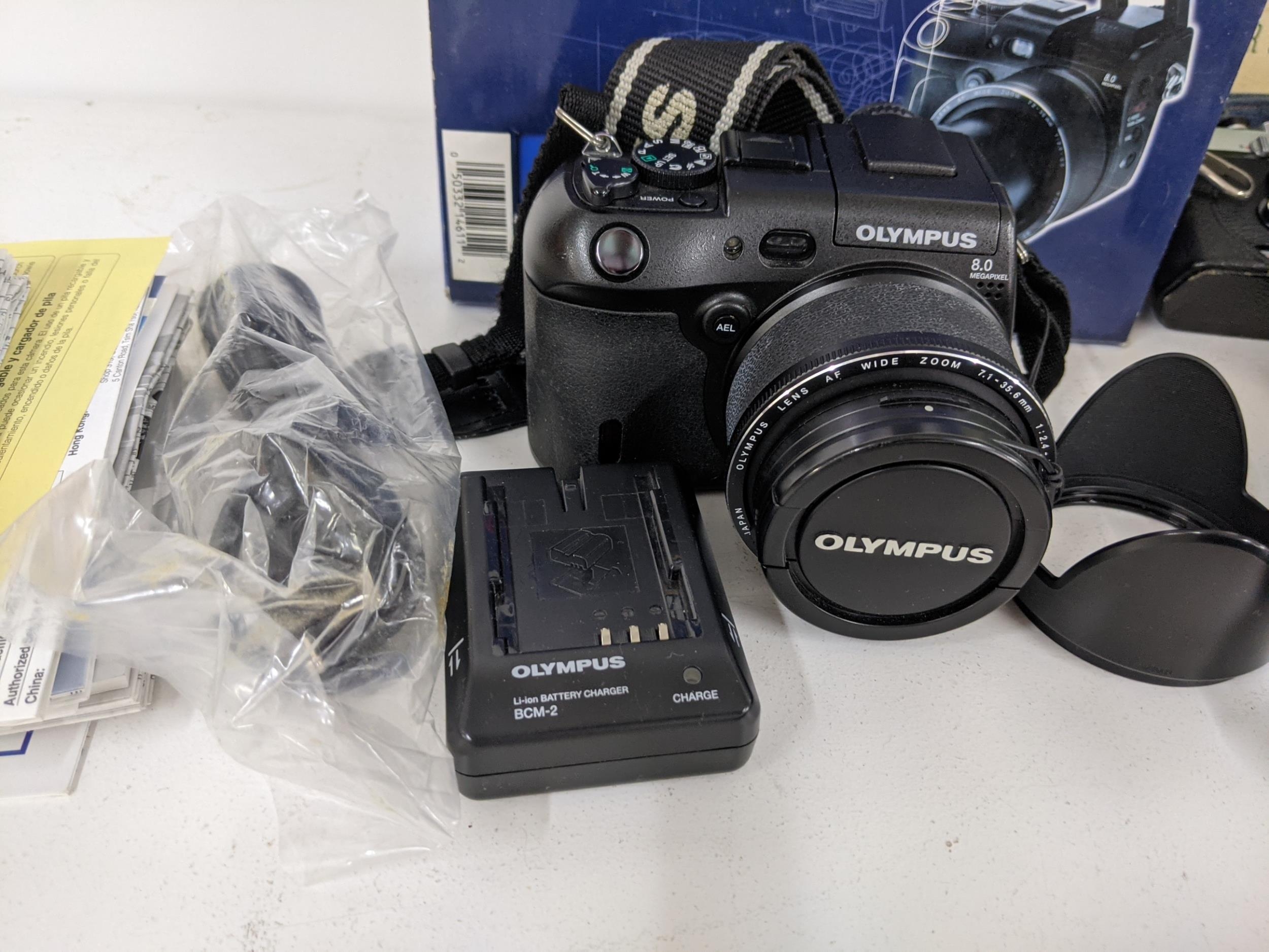 Olympus cameras, equipment and photography accessories to include two Olympus OM-2s, an Olympus OM- - Image 3 of 10