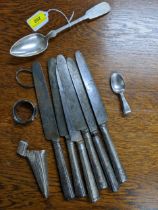 Silver items to include a German 800 silver spoon,Child's spoon, Georgian silver handled knives