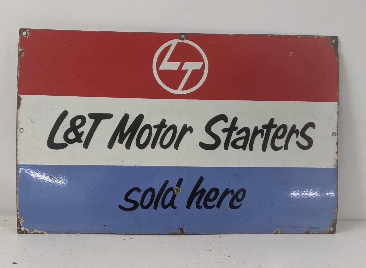 A late 20th century Landt motor starters enamel advertising sign 66cmW x 41.5cm H Location: If there
