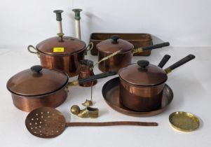 Metalware to include a copper plated pan set, candlesticks and other items Location: If there is