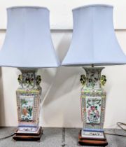 Two Chinese 20th century Famille Rose table lamps, one decorated with panels of figures and other of