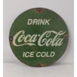 A late 20th century Coca cola enamel advertising sign 38cm diameter Location: If there is no