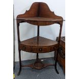 A George III mahogany corner washstand having two open shelves and three drawers 96.5cm h x 53cm w