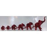 A family of red Murano glass elephants, six elephants, the largest 9cm, the smallest 2cmh