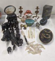 An Oriental and Indian related mixed lot to include a pair of brass candlesticks fashioned as rattle