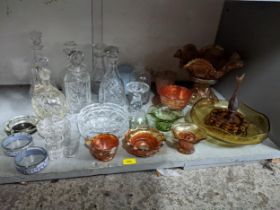 A collection of art deco, marigold carnival glass and cut table wares to include decanters and