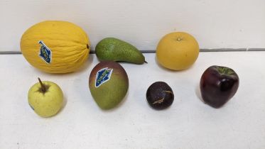 A collection on Penkridge model fruit to include a melon, a grapefruit, apples, mango, pear and a