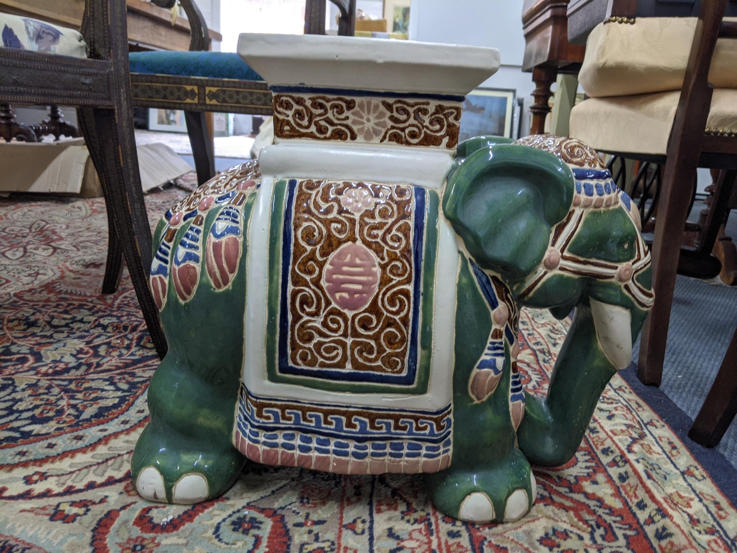 A 20th century conservatory stool fashioned as an elephant draped in Indian textiles and finery - Image 3 of 6