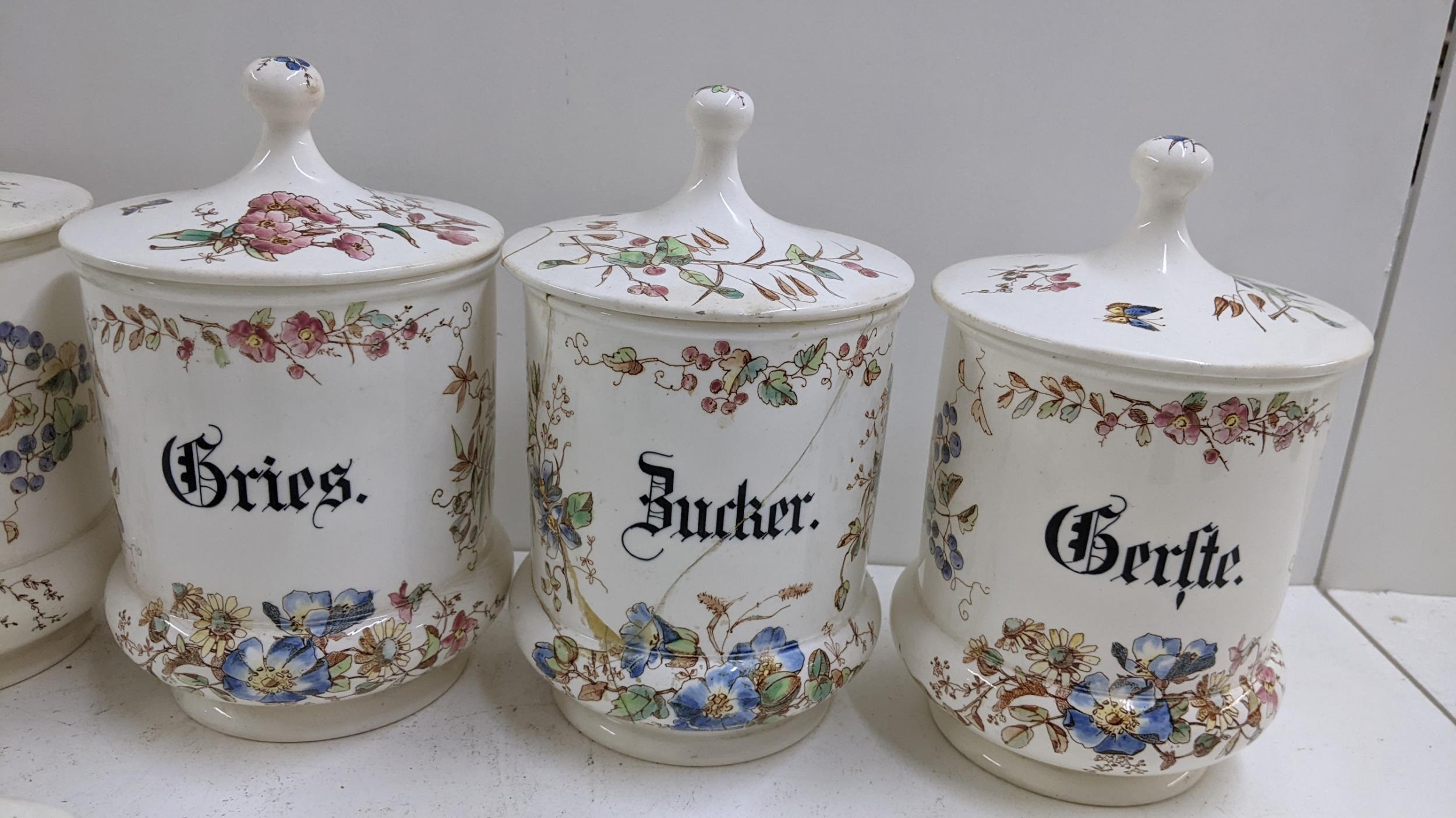 A group of late 19th century German kitchen jars, together with a flour jar circa 1900 Location: 2:2 - Image 2 of 7