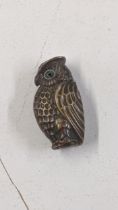 A 19th century copper and brass vesta case fashioned as an owl Location: If there is no condition