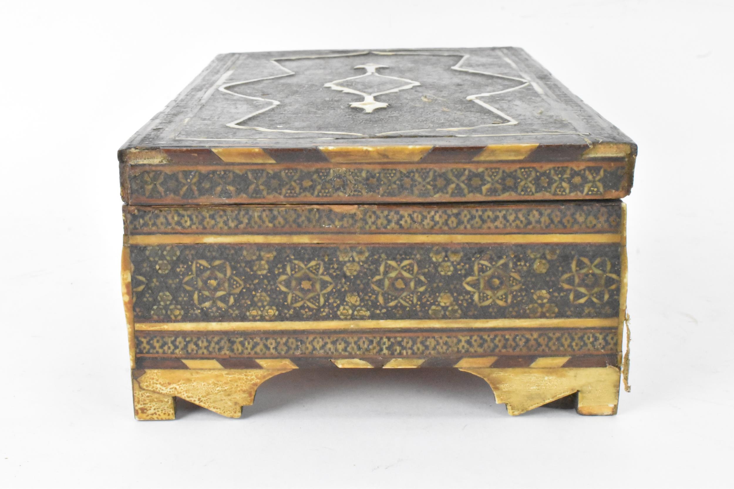 A Persian late Qajar dynasty box, of rectangular form, profusely inlaid with micro-mosaic inlaid - Image 4 of 6