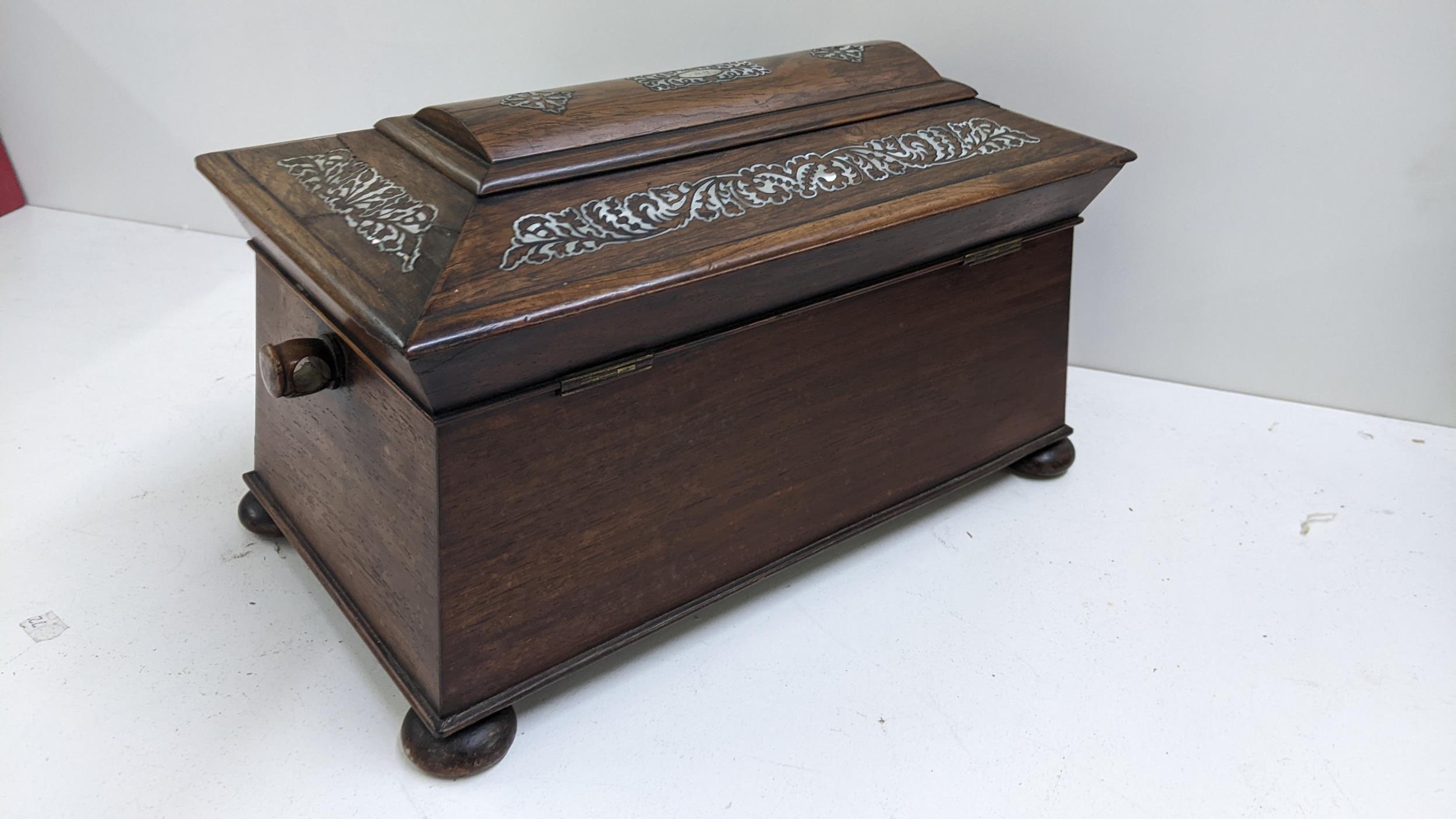 A William IV rosewood sarcophagus formed box, inset with mother of pearl and standing on bun - Image 2 of 3