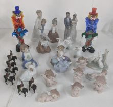 A collection of Lladro and Nao figurines to include six Nao cheeky cherubs, Lladro 4874 boy and girl