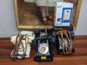 Telephones - three black rotary dial phones, one cream, two BT Tribune phones, one red one white and