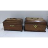 Two 19th century mahogany sarcophagus formed tea caddies, both with brass swan neck handles and
