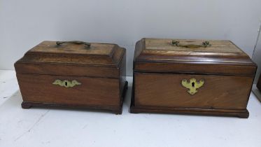 Two 19th century mahogany sarcophagus formed tea caddies, both with brass swan neck handles and