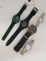Five various fashion wrist watches, one ladies, three gents and one unisex Location: If there is