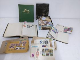 A collection of stamps, some mounted in albums, some loose, along with 1st Day covers to include