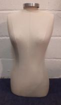 A fabric covered table top mannequin 28" High. Location:BWR If there is no condition report shown,