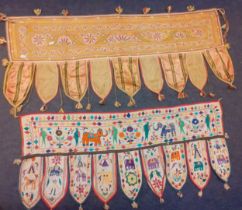 Two 20th Century traditional Indian hand embroidered window valances, 47" long and 40" long together
