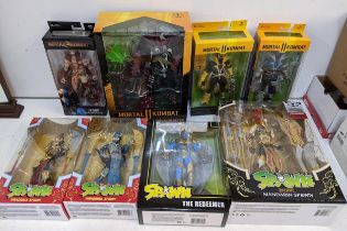 A mixed lot of collectable figures and McFarlane toys to include 'Spawn Deluxe - Mandarin Spawn', '