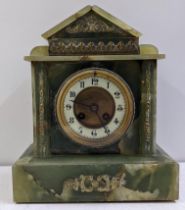 A late 19th century French onyx cased 8 day mantle clock of architectural design 28cmhx24cmW