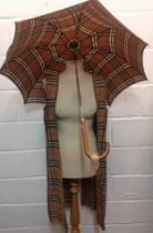 Burberrys-A 1970's tartan trench coat liner approx 36" chest together with a 1970's umbrella