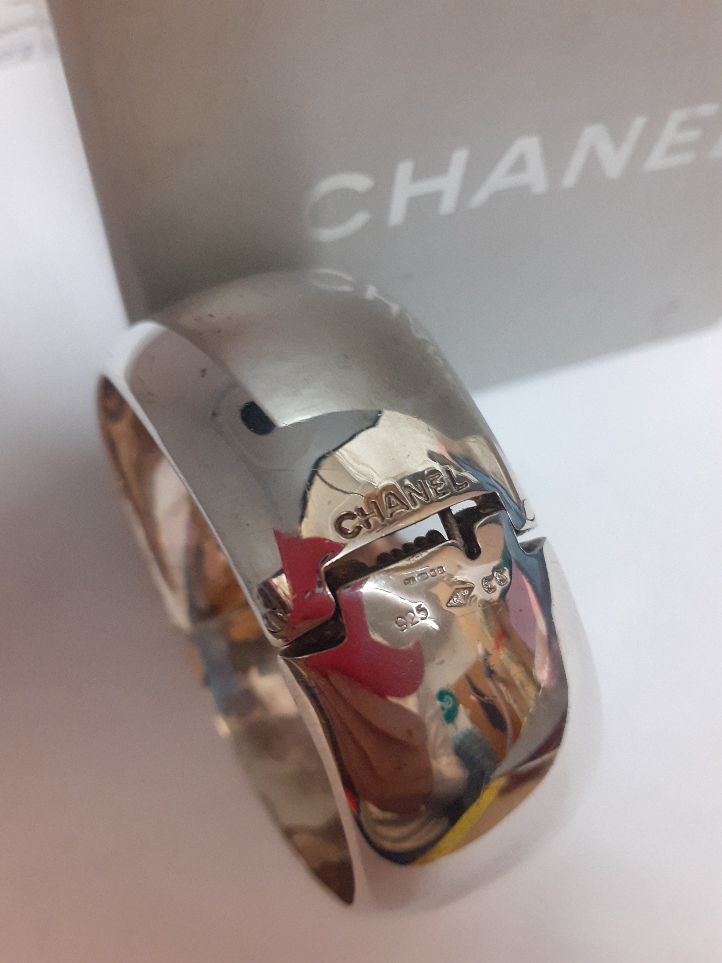 Chanel-A wide silver cuff bangle branded towards the opening and to the hinge, stamped 925 with grey - Image 3 of 4
