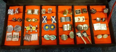 A collection of gents cufflinks to include pairs depicting the Scottish flag, guitars, taps, the