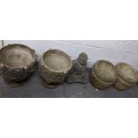 Two pairs of weathered concrete garden planters to include a pair on pedestal bases with raised