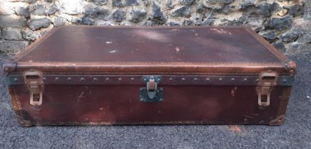 Louis Vuitton- An early 20th Century Louis Vuitton travel trunk, serial no:142412, having chestnut