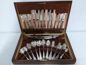 A B & A Butterfield canteen of silver plated cutlery in a walnut veneered box Location: If there