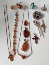 A quantity of modern silver and white metal jewellery with amber and amber effect cabochons to