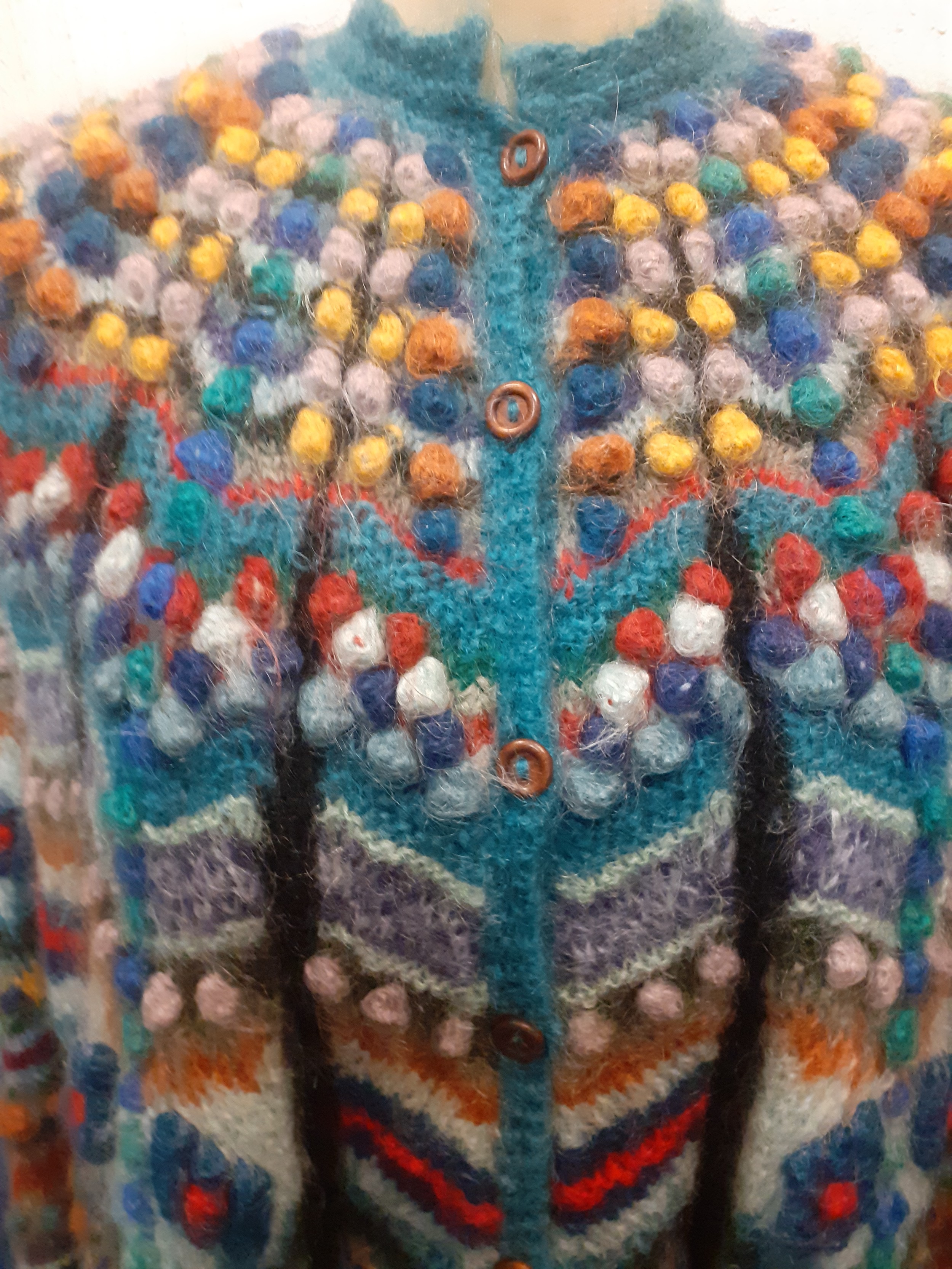 A vintage handmade woollen cape approx up to 40" chest, possibly Welsh having a multicoloured zig- - Image 2 of 7