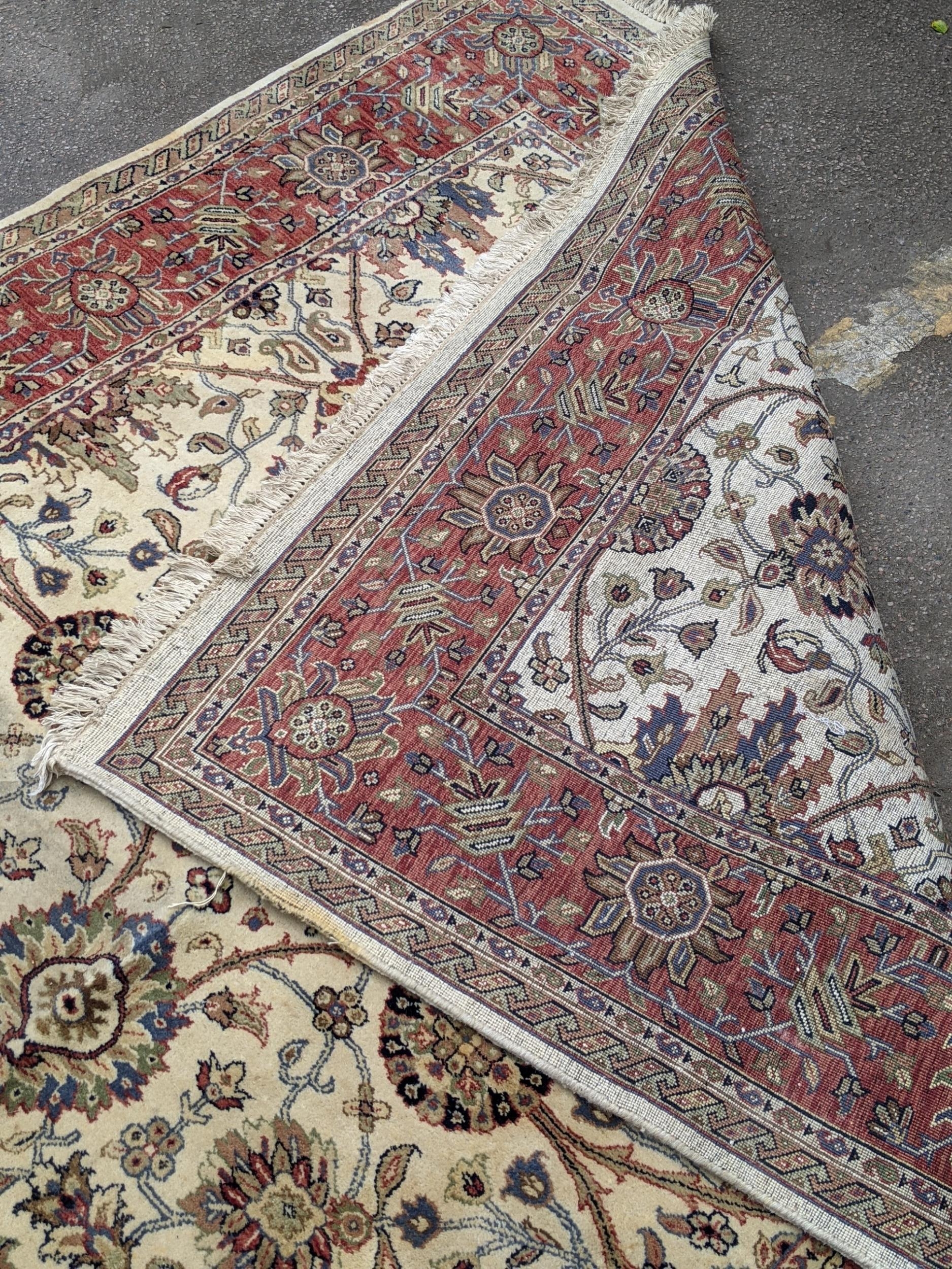 An antique Sharaen rug decorated symmetrically with four large medallions and four smaller ones on a - Image 7 of 9