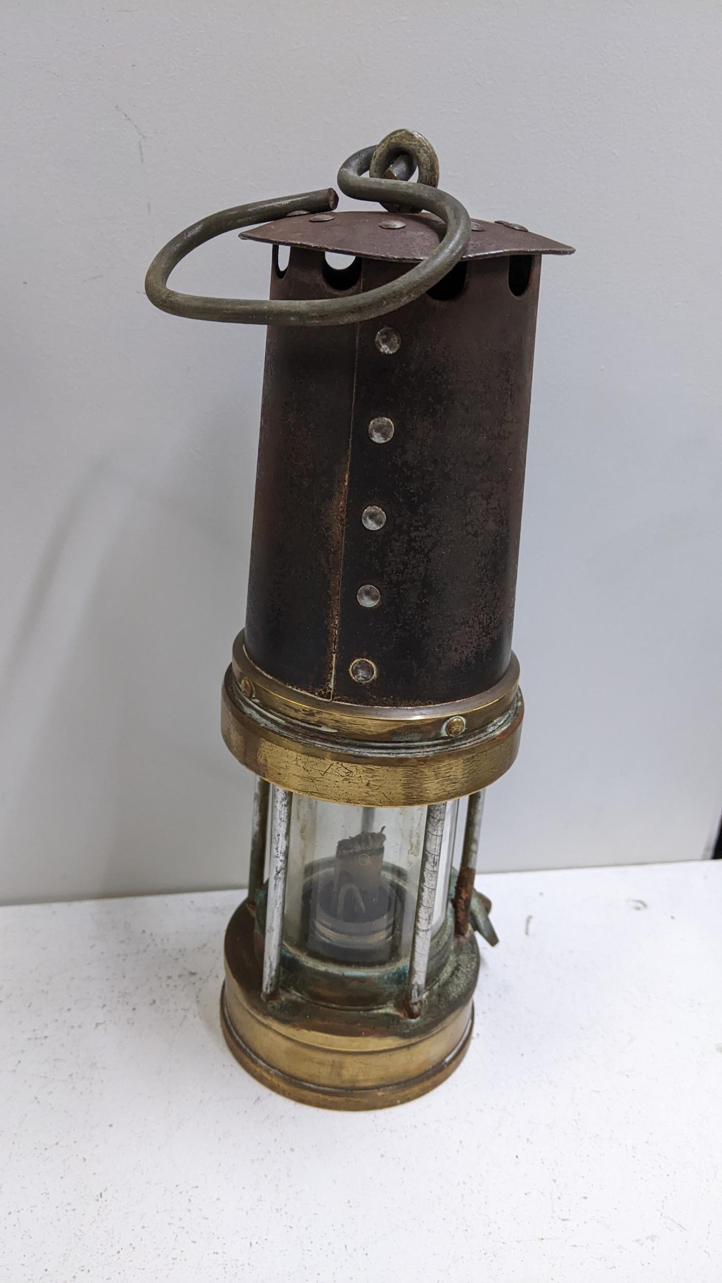 A brass and steel miners lamp by Patterson lamps Ltd Location: If there is no condition report - Image 2 of 2