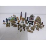 A collection of Chinese ceramic mudmen, buildings, bridges and pagodas figurines, a porcelain