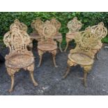 A set of eight Victorian pained cast iron garden chairs on splayed legs Location: If there is no