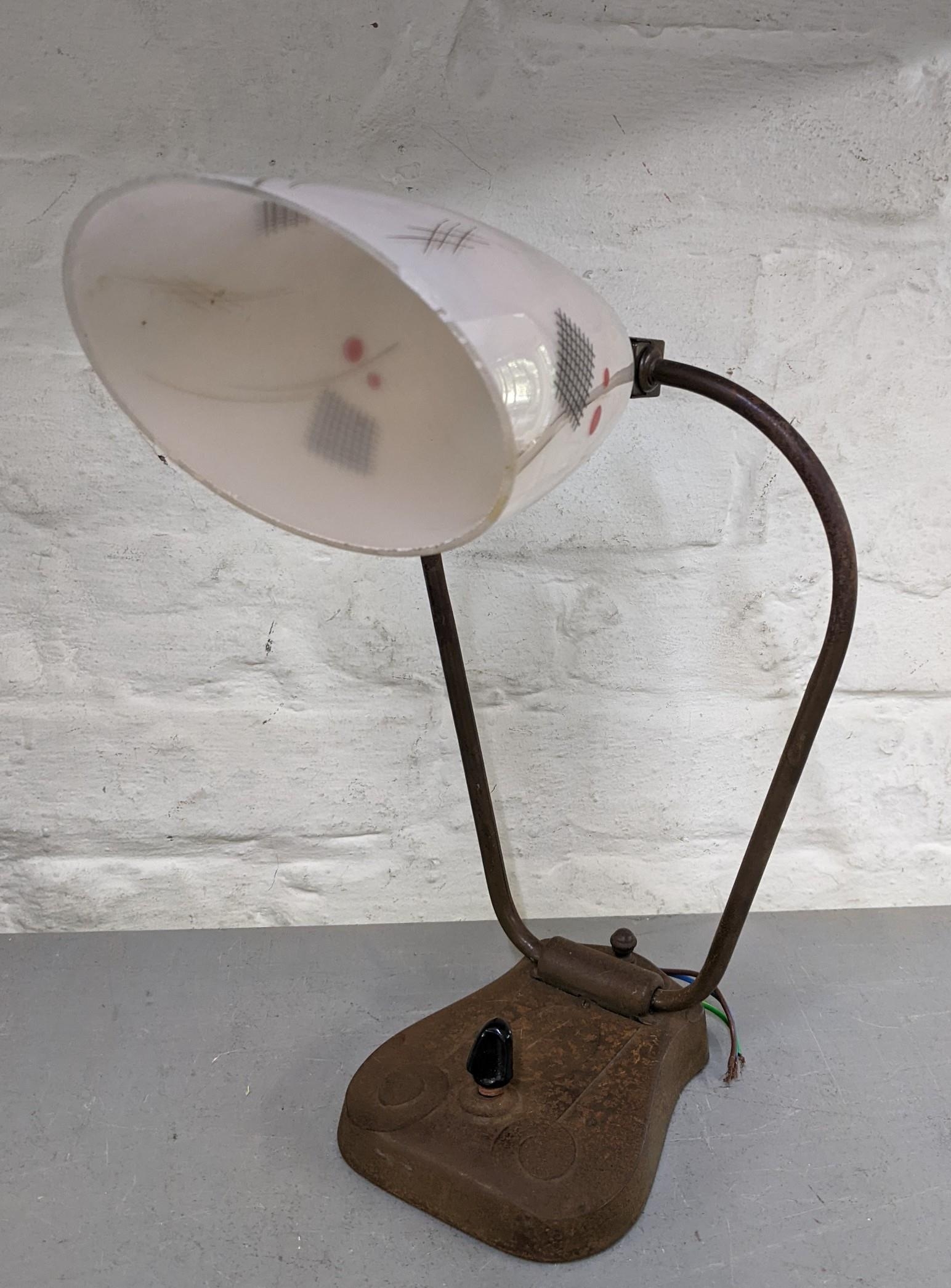 An Arts and Crafts style lamp with glass shade Location: If there is no condition report, please