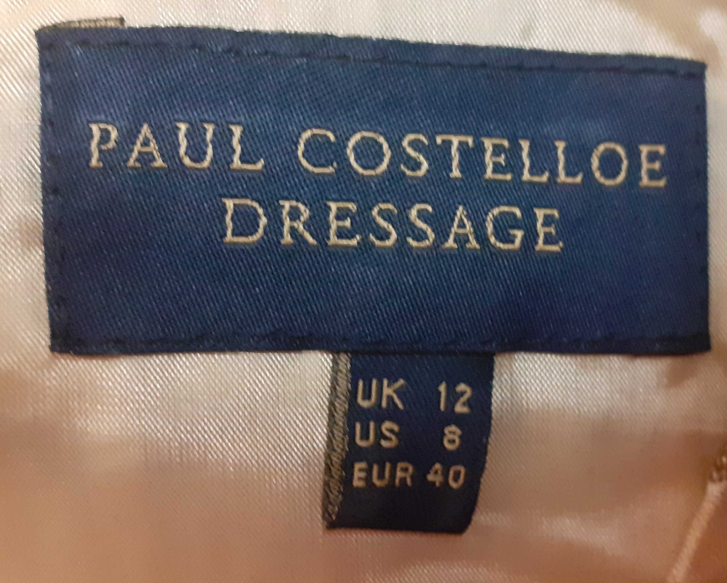 Paul Smith and Paul Costello-A red Paul Smith 'Blue Collection' cardigan with floral back panel size - Image 4 of 5