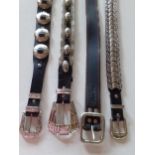 A group of 4 x 1980's black leather Western inspired/glam rock ladies belts with elaborate silver