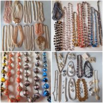 A quantity of vintage costume jewellery to include simulated pearl necklaces to include a Chomel