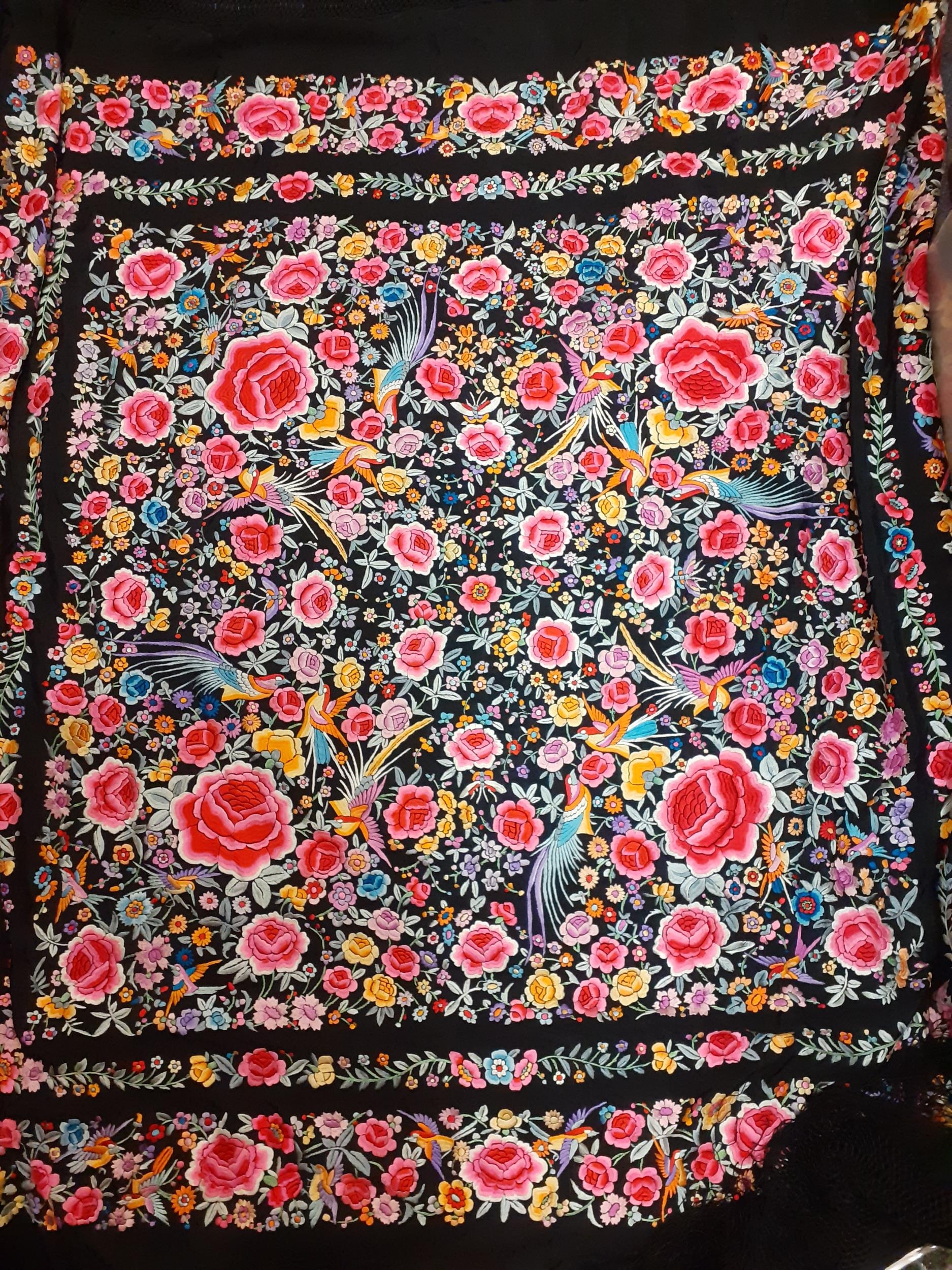 An early 20th century machine embroidered black Oriental shawl with vibrant images of roses, wild - Image 3 of 4