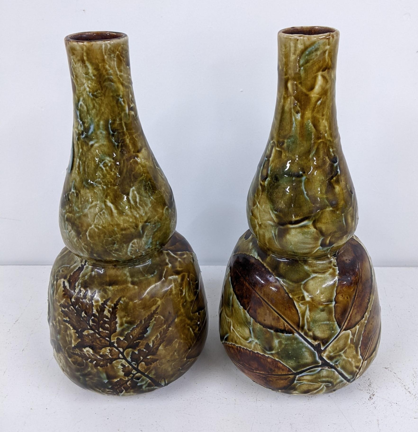 A pair of late Victorian Doulton Guord vases Location: If there is no condition report shown, please