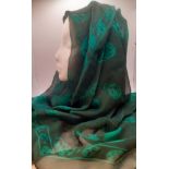 Alexander McQueen-A green chiffon scarf with images of skulls, 120cm x 100cm Location: R1.1